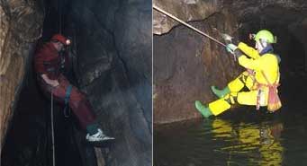 man climbing inside a cave