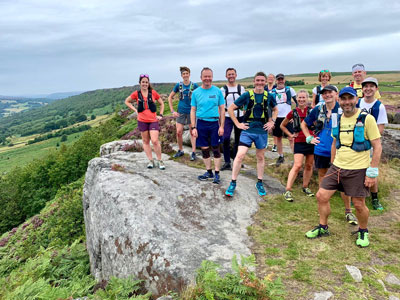 Andy Brooks (right) leading a group in the Peak District