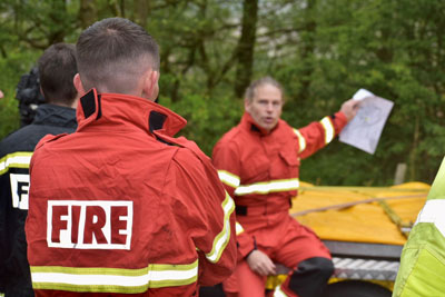 Firefighters being briefed at Stanage Edge
